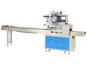 Horizontal flow wrapper, packing machine with gas flush device