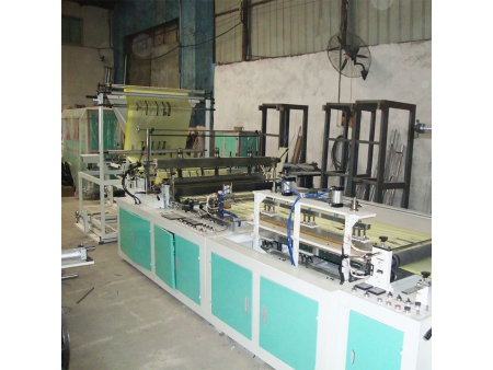 Computer Controlled Ribbon-Through Garbage Bag Making Machine