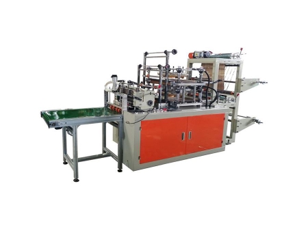 Computer Controlled Plastic Glove Making Machine