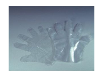 Computer Controlled Plastic Glove Making Machine
